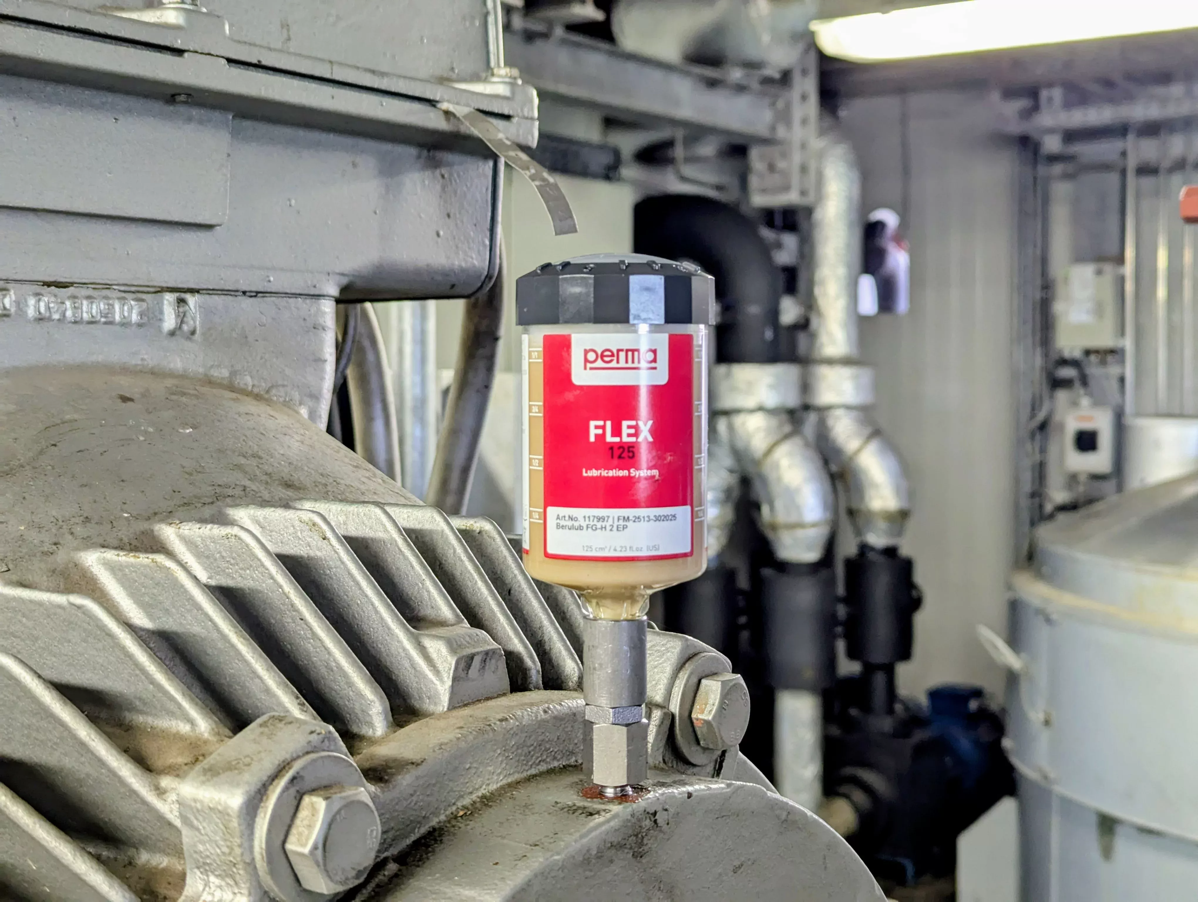 Dispensador de perma que se utiliza en una máquina